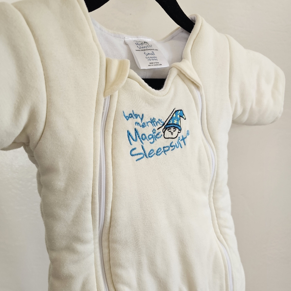 Baby Merlin's Magic Sleepsuit in Cream